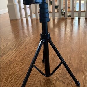 Sleek Black Camera Tripod for Stable Shots